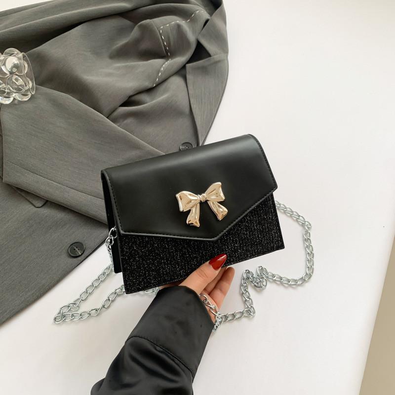 Modische Frühjahrs-Schmetterlingsknoten-Umhängetasche in eleganten Unifarben für einen trendigen Stil