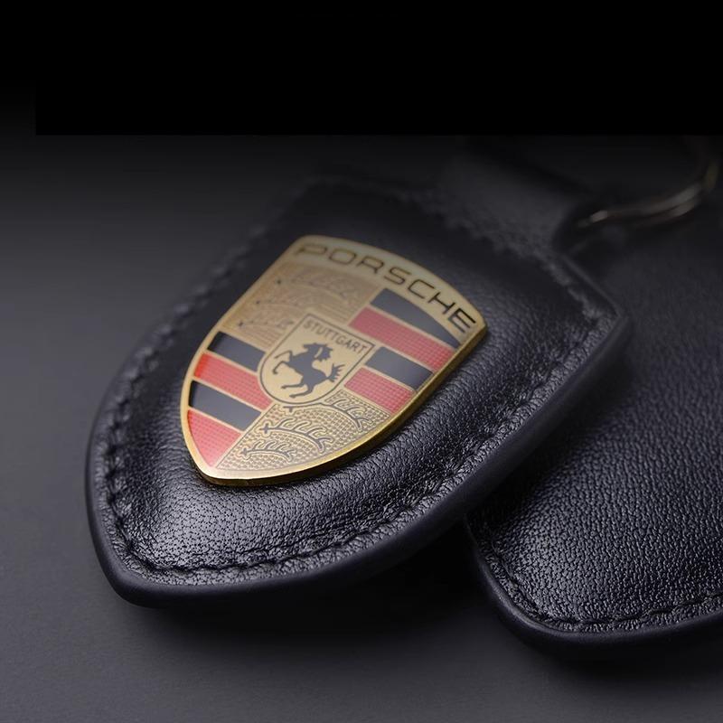 PU-Leder Auto-Schild Schlüsselanhänger Styling Schlüsselanhänger Anhänger für Porsche Cayenne Panamera Macan 911 Taycan Boxster Cayman 918 Pajun