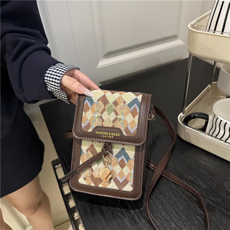 

Retro high-end fashion printed mobile phone bag women s autumn new niche personality small and versatile messenger bag хакі