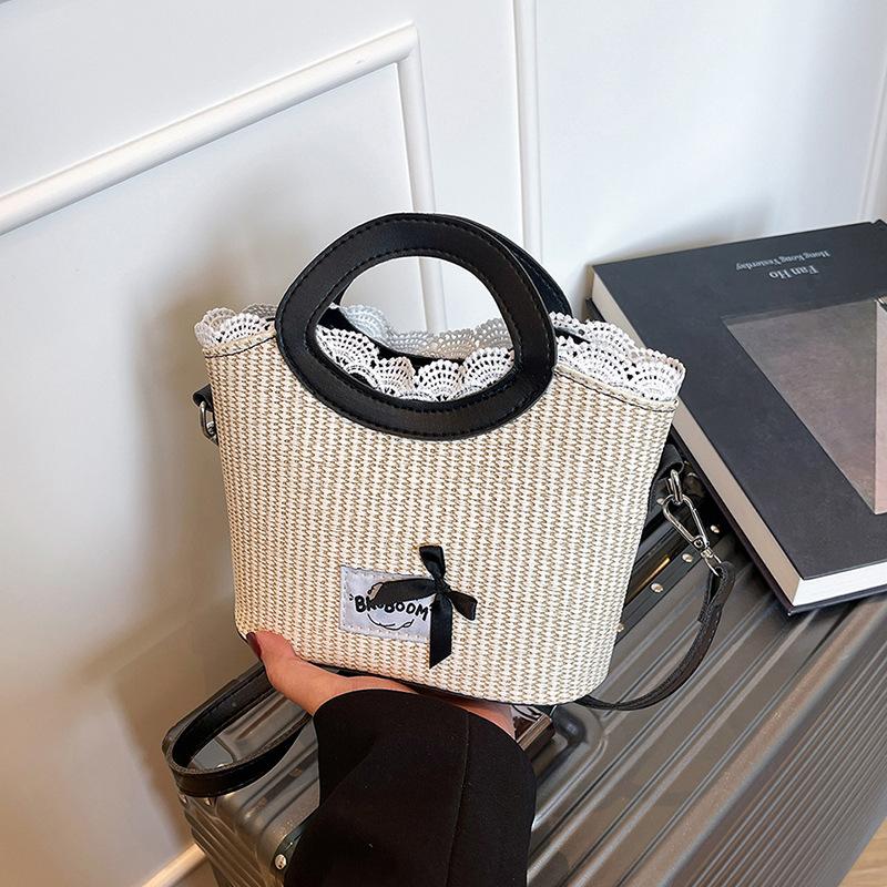 

Large capacity straw woven bag women s summer 2025 new casual niche messenger bag popular portable woven bucket bag чорний