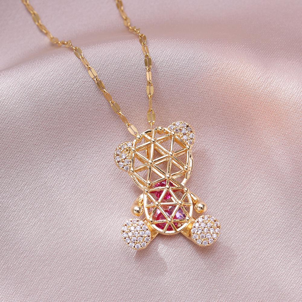 Damen Titanstahl Halskette mit goldenem Zirkonia, hohles Bär-Design, japanisch-koreanischer Stil, grenzüberschreitende Nischenmode.