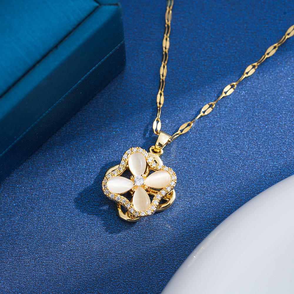 Women s Rotating Bauhinia Zircon Pendant Necklace - Niche Fashion, New Design, Titanium Steel