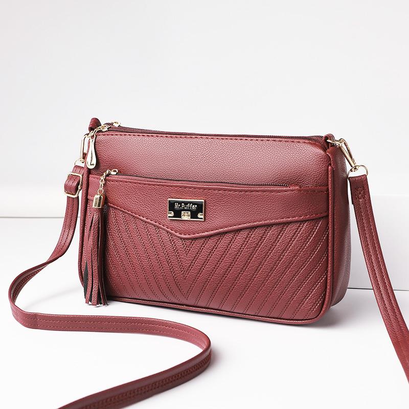 

Spring women s bag fashion retro armpit bag plaid embossed high-end single shoulder bag 26*8*16cm червоний