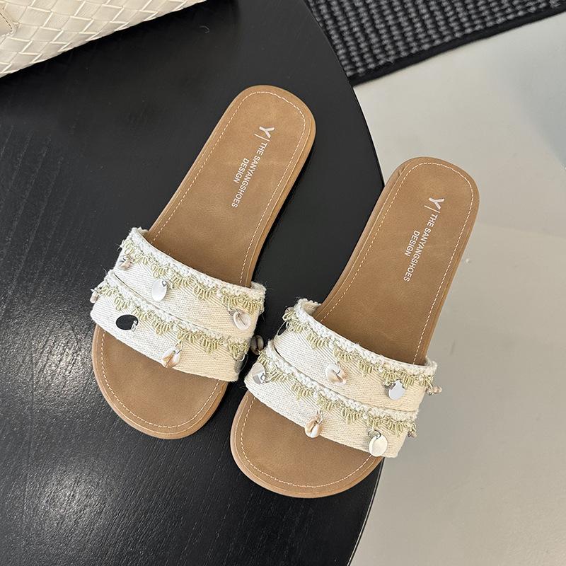 Xiaoxiangfeng Perlen-Slipper Damen Oberbekleidung 2025 Sommer neue flachbodige Mode Urlaub Küste Strand Sandalen Ein-Wort-Schlepper