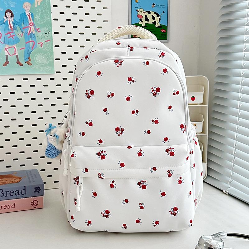 The new schoolbag is high-value, fresh and sweet floral backpack, and the lightweight spring outing backpack for junior high school students.