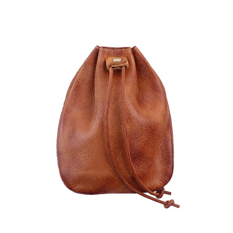 

Head Layer Cowhide Money Bag, Hand Polished Portable Coin Bag, Drawstring Pocket, Loose Change Leather Bag, Stationery Bag, Retro Style світло-коричневого кольору