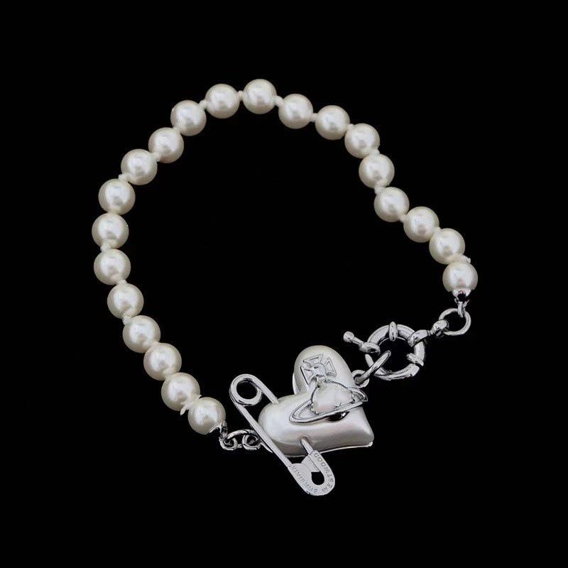 

Вдовствующая императрица Вивиан: Осеннее 23 Жемчужное ожерелье с пряжкой-сердцем и брошью - Элегантный женский стиль