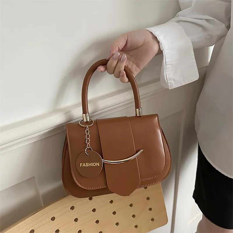 

High-End Niche Design Bag Women s Bag Popular Messenger Bag Single Shoulder Saddle Bag 23cm*14.5cm*7cm коричневый