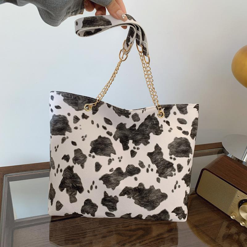 

Cow pattern large capacity versatile tote bag women s leisure personality retro simple college student class shoulder bag