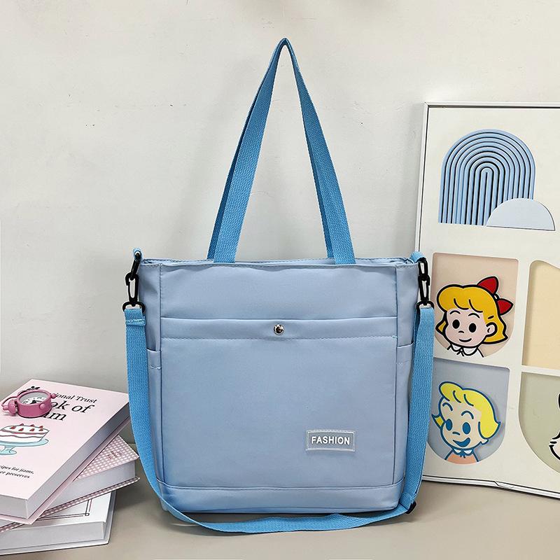 

Solid color nylon shoulder bag casual versatile large capacity portable tote bag student outdoor travel messenger bag One Size