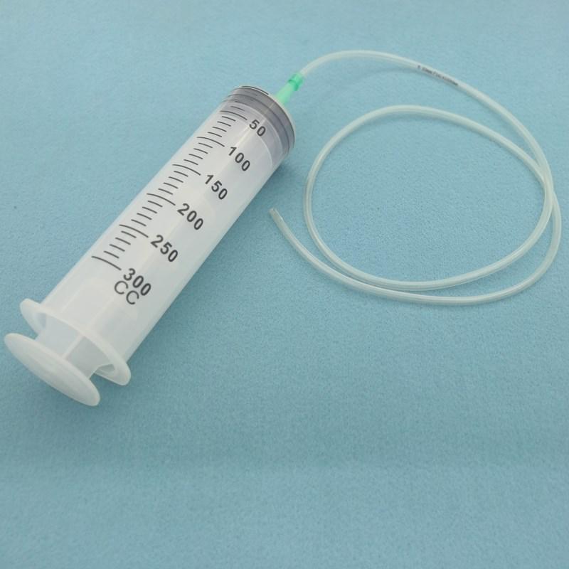 High-Capacity Flushing Syringe with Coarse Needle for Glue or Enema
