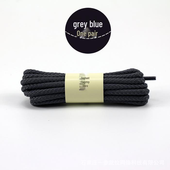 Martin Høy-Topp Militærstøvler i Skinn: Britisk hverdagsklær med runde svarte og hvite skolisser.