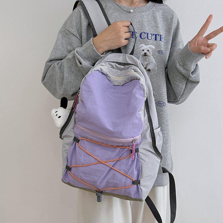 Schoolbag travel easily, a backpack, full of trendy fashion nylon zipper contrasting colors