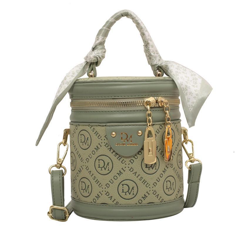

Autumn 2026 Trendy Women s Round Bucket Crossbody Bag: Solid Color, Textured, Hand-Held, and Stylish. зелёный