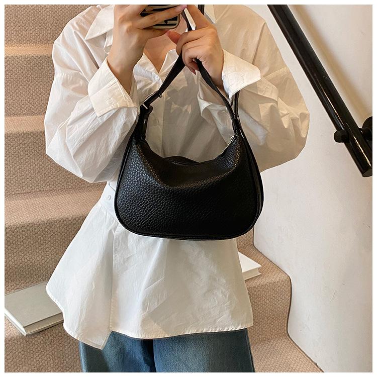 Simple and fashionable bag women's 2025 new Korean version versatile shoulder underarm bag niche high-end dumpling bag messenger bag