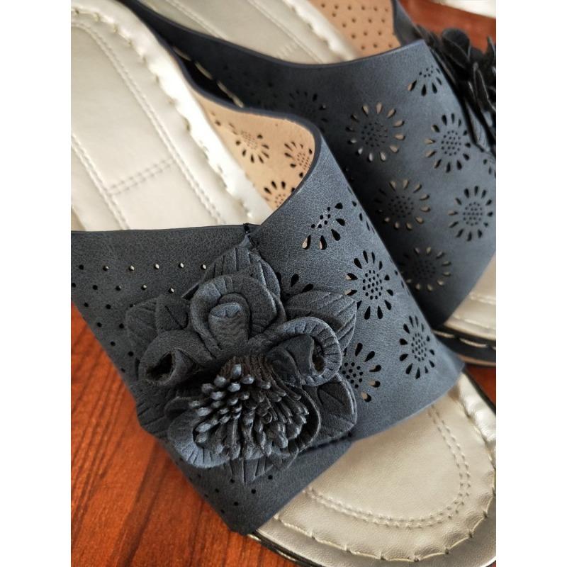 Large size slope heel slippers women's summer new hollow flower flat bottom one-word cool slippers beach women's shoes