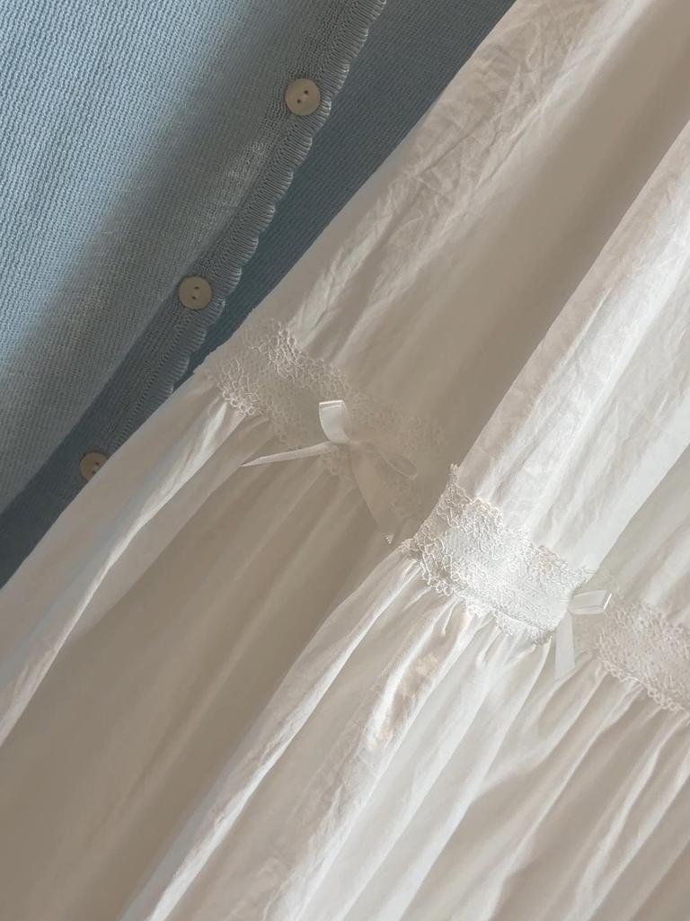 Women's A-line White Cake Skirt with Bowknot and Wood Ear Edge, Spring 2026 Collection - Mid-length, Loose, Slimming, Large Hem.