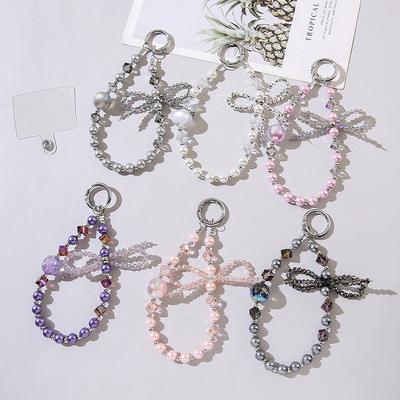 Accesorii pentru telefoane – Curele și brelocuri pentru telefoane