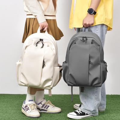 Allsidig skoleryggsekk for studenter: Fasjonabelt design med høy kapasitet for gutter og jenter i ungdomsskolen, videregående skole og høyskole.