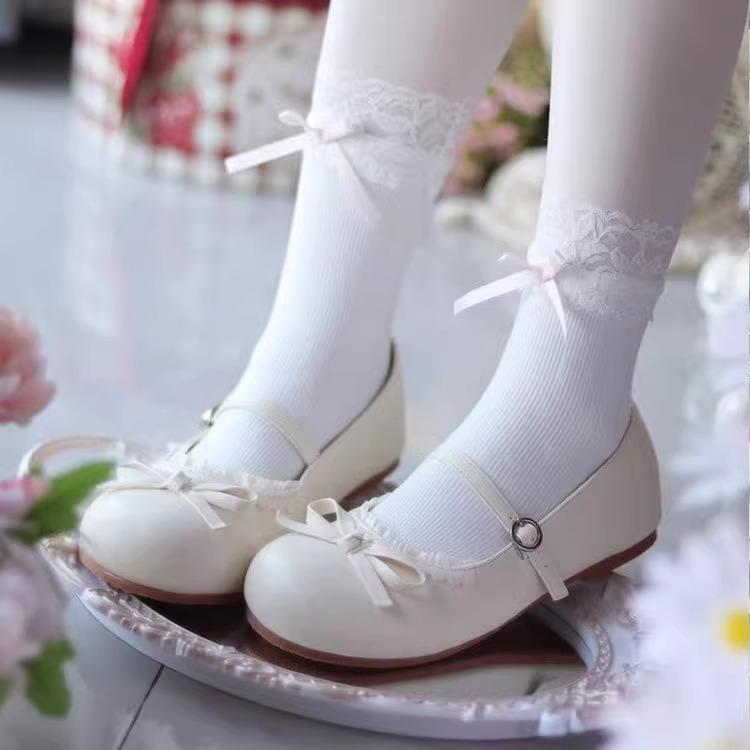 2025 new French retro white round head bow flat-soled single shoes women's spring one-pedal soft-soled beanie shoes