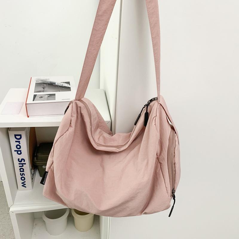 

Crossbody bag men s Japanese simple large-capacity casual fashion canvas bag student simple class bag new shoulder bag розовый