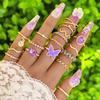 European and American new dripping butterfly imitation gemstone and diamond ring set Geometric twist ring seven-piece set