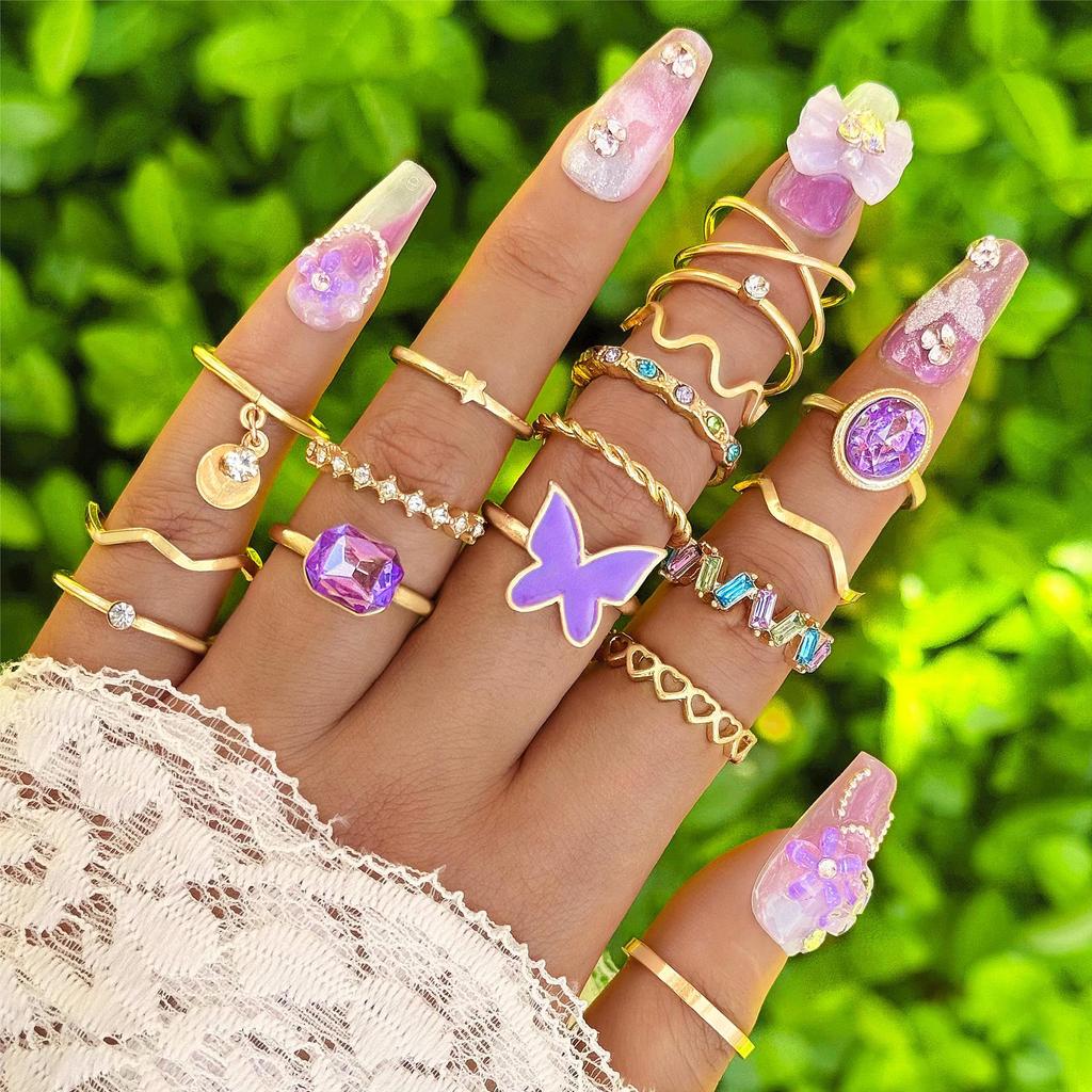 European and American new dripping butterfly imitation gemstone and diamond ring set Geometric twist ring seven-piece set