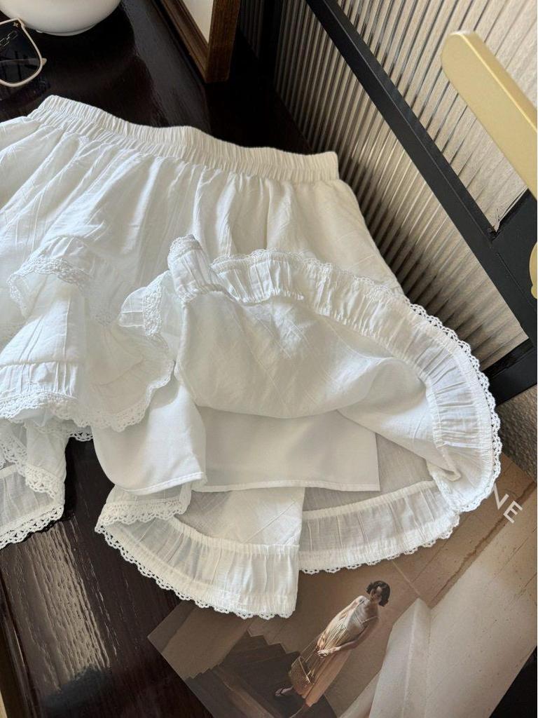 2026 New Irregular White Lace Trim Patchwork Cake Skirt: High Waist, Fluffy, Short Women's Skirt