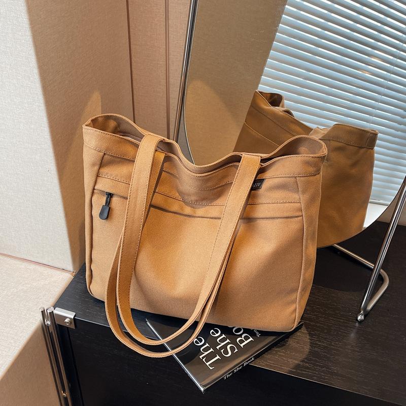 Casual large-capacity canvas bag women's new fashion versatile shoulder bag college student class bag