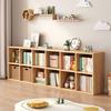 Solid Wood Bookshelf: Floor-Standing & Wall-Leaning Grid Cabinet for Living Room or Kindergarten Storage.