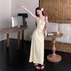 Yellow suspender dress women's summer new French waist design seaside vacation floral long skirt