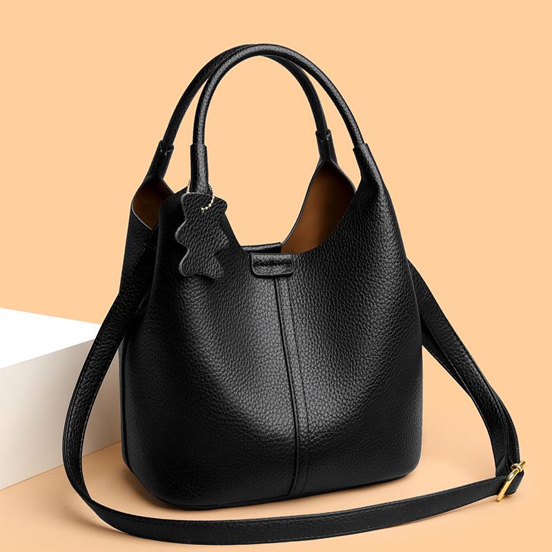 2025 High-End Genuine Leather Women's Shopping Basket Bag with Double-Sided Texture and Leather Tag.