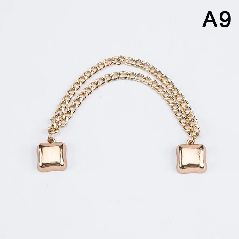 Clip per gambe dei pantaloni regolabili magnetiche per pantaloni, spilla retrattile per pantaloni con gamba fissa, bottone allentato per jeans, cardigan
