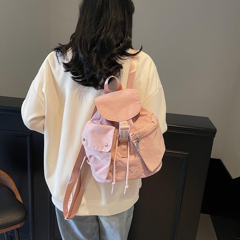 New Korean version of leisure niche design handbag large capacity personalized student class commuting leisure backpack