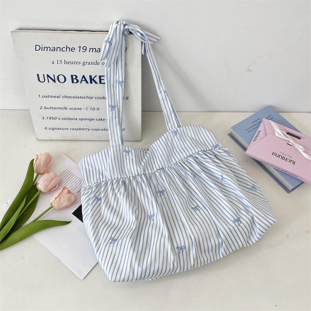 

2025 Korean Style Plaid Canvas Tote Bag - Lightweight, Versatile Shoulder Bag with Pleated Tie Design.