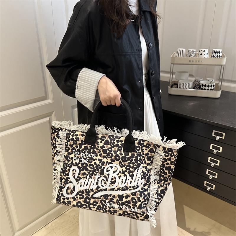 New Women's Large-capacity Leisure Travel Leopard Print Canvas Bag New Handmade Tassel Handbag One-shoulder Tote Bag