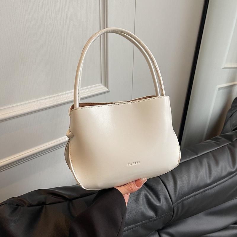 Simple Portable Bucket Bag Spring New Fashion Trend Niche Solid Color Shoulder Messenger Bag