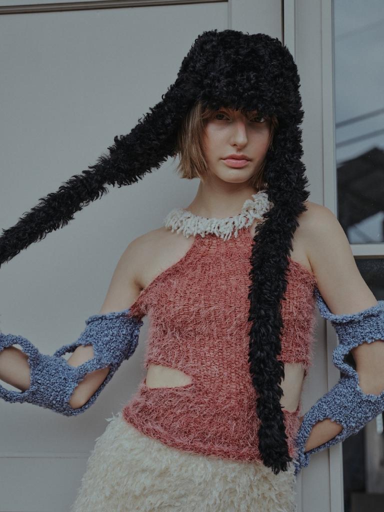 Poejidam Knot Earflap Hat In Furry Black