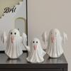 Bedroom Atmosphere Table Lamp Light Up Ceramic Ghost Figurines for Halloween Decor, Cute White Statue Dried Flower Floral Arrangement with Pink