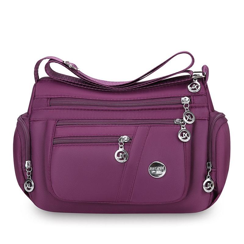 Bag Women's Large Capacity Shoulder Bag Waterproof and Wear Resistant Multi Pocket Commuter Leisure Outdoor Crossbody Bag
