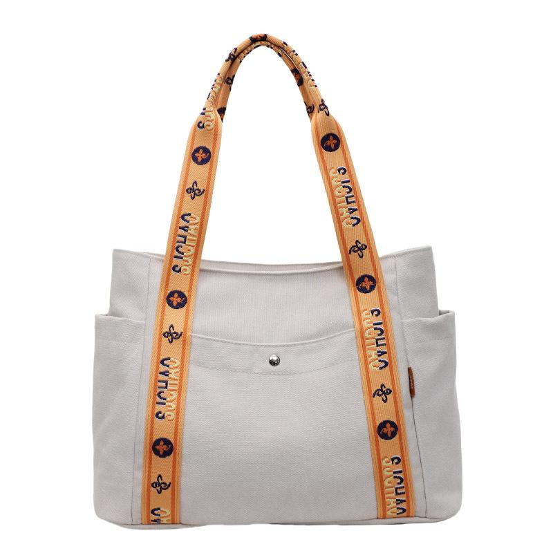 

Casual shoulder bag, personalized shoulder strap splicing contrasting color handbag, college student class commuting canvas bag One size