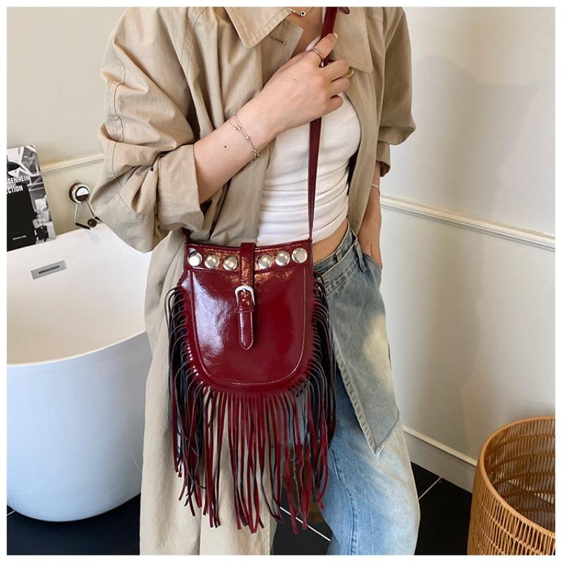 Bag women's spring and summer new fashion retro shoulder oblique span bag bucket bag fringed bag
