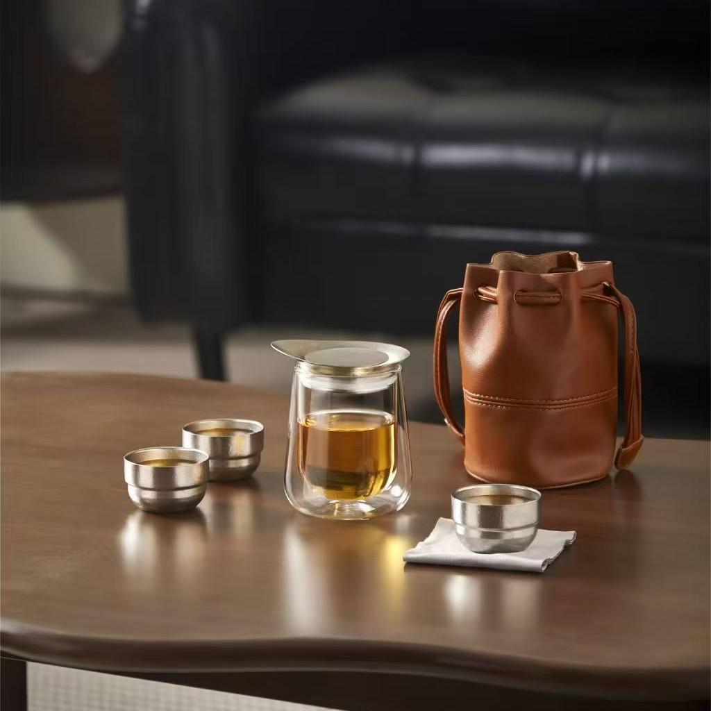 Portable Double-Layer Borosilicate Glass Teapot Set with Titanium Filter and Three Cups.