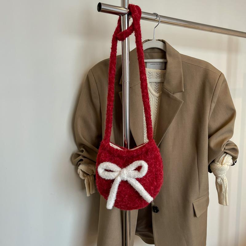 Korean spring new fashion niche design large-capacity student foreign style bucket bag women's shoulder trend oblique span bag