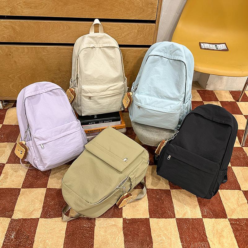 Simple Student Backpack with Large Capacity Multiple Pockets Casual and Lightweight Suitable for Daily and Student Use