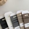 Retro Solid Color Fabric Label Mid-Calf Seamless Toe Women's Socks for Autumn and Winter