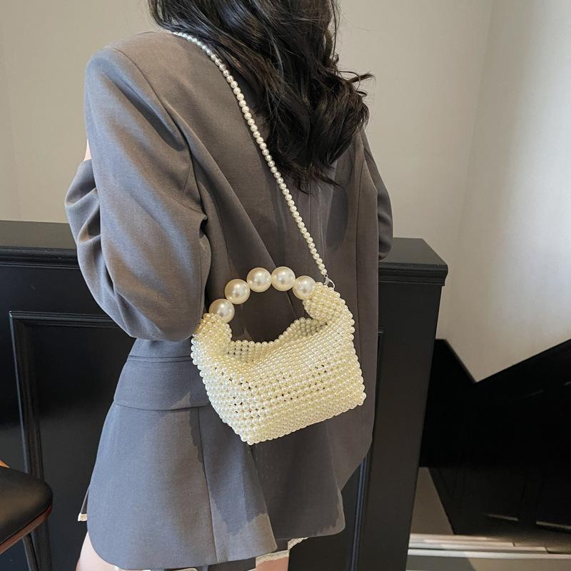Pure hand-woven dinner bag female retro fairy pearl bag trendy large capacity portable shoulder bag
