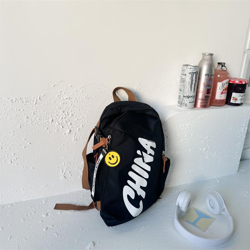 Modern Stylish Canvas Backpack For Kids With Cool Letter Print Design And Large Capacity чёрный