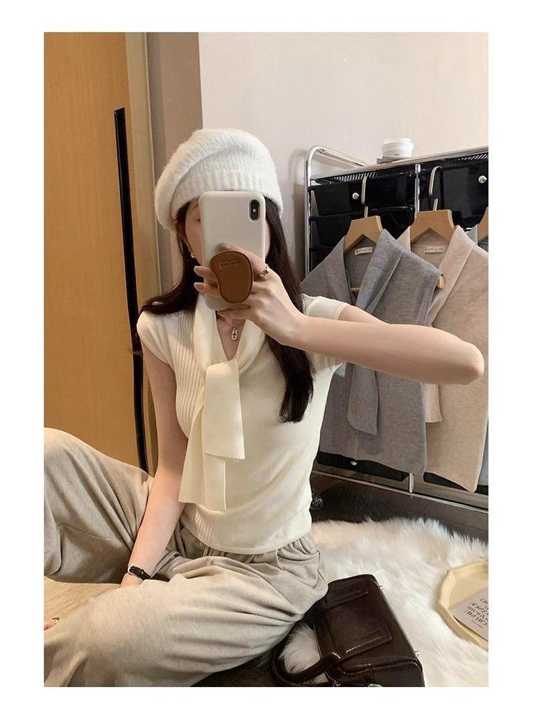 2025 Summer Women's V-Neck Knit Top with Shoulder Pads and Ribbon - Hong Kong Style