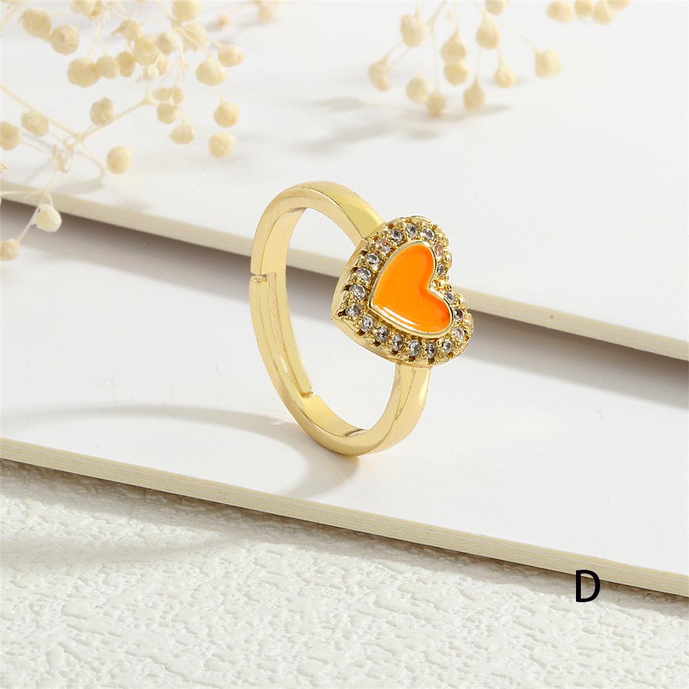 High-End Damenringe aus Europa und Amerika: 18K Kupfer, Mikropavé Zirkon, Herzförmiges Pfirsichherz, Buntes Tropföl, Verstellbar.